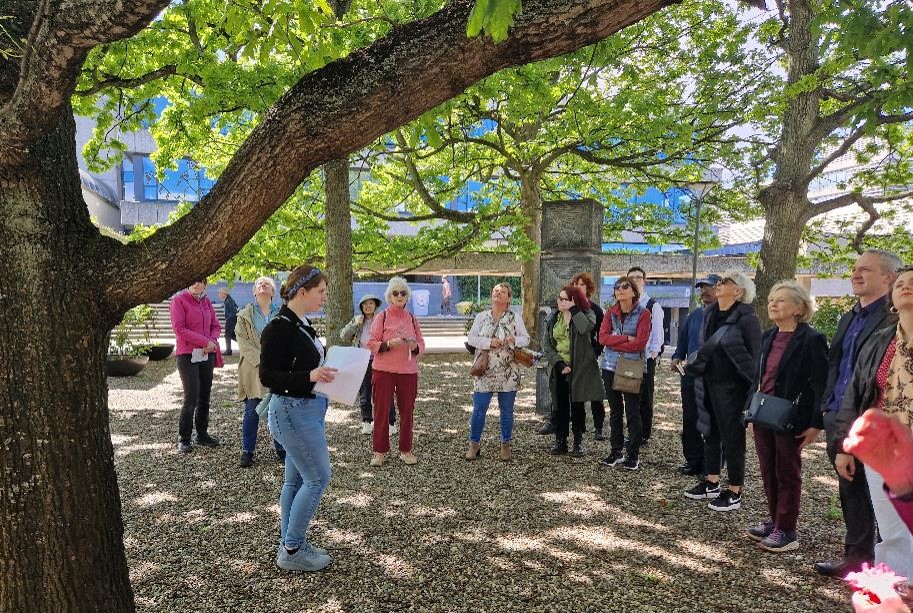 Group of people under a tree